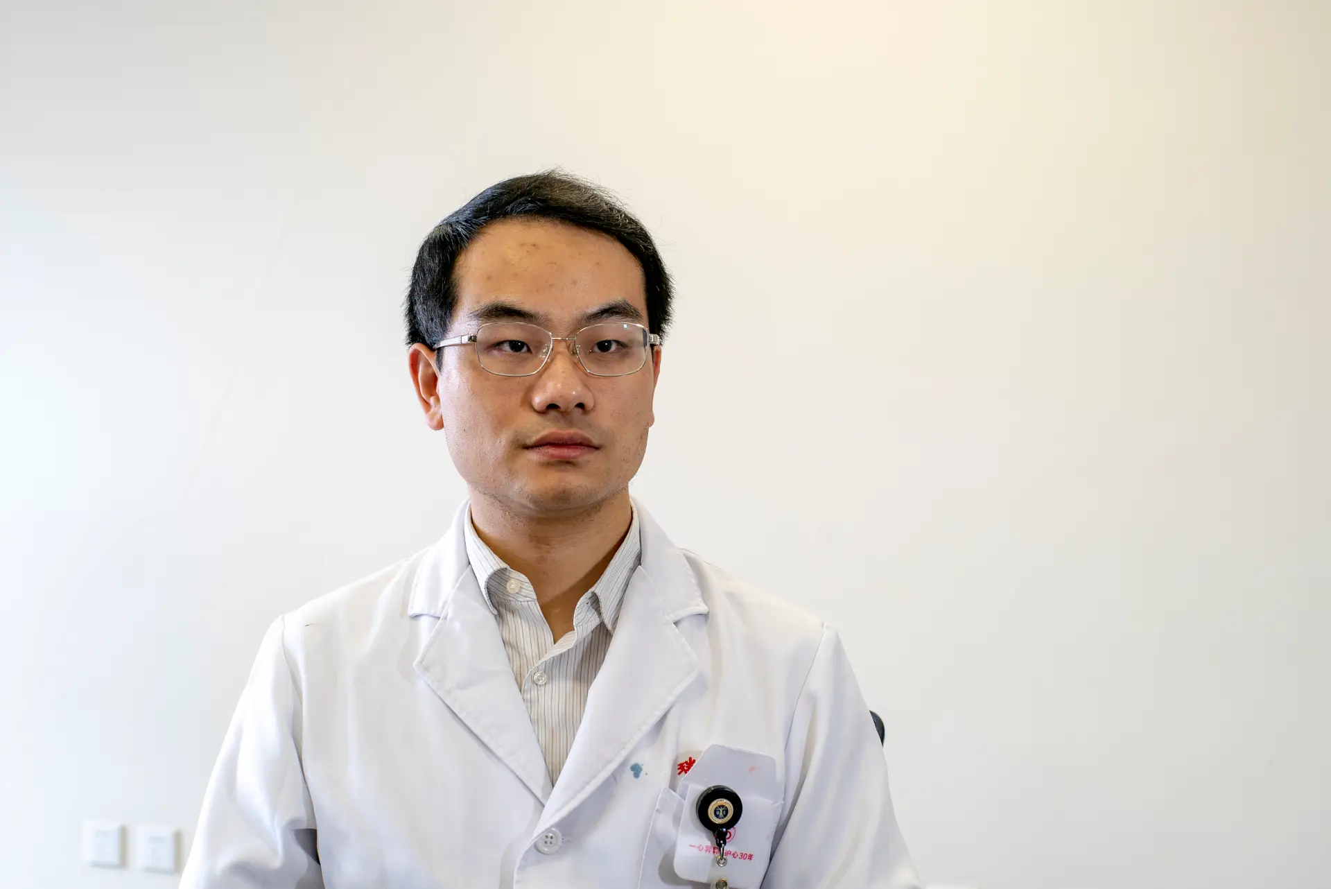 Xiao Qun Wang