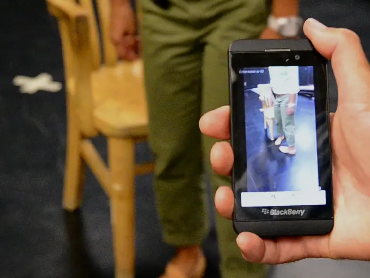 Evaluation of a Smartphone-based Human Activity Recognition System in a Daily Living Environment