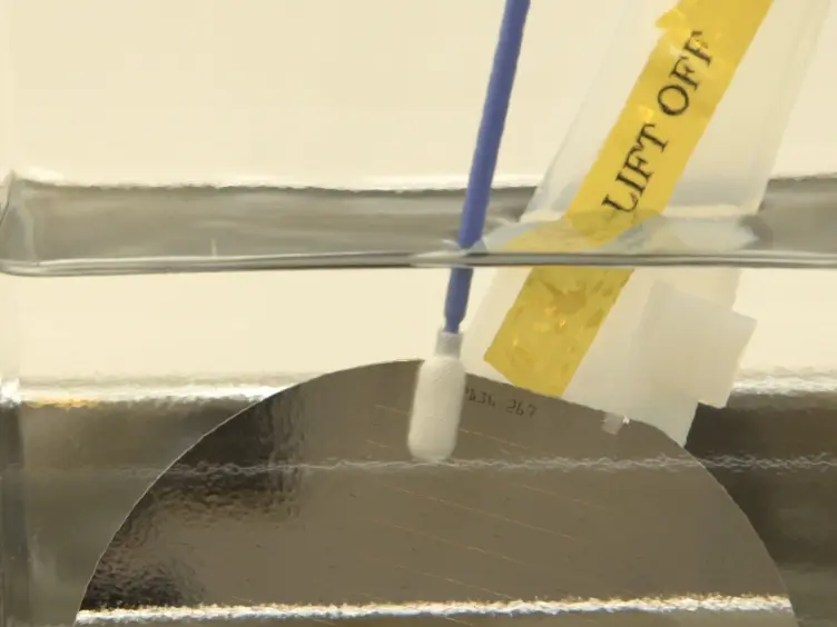 Fabrication of Low Temperature Carbon Nanotube Vertical Interconnects Compatible with Semiconductor Technology