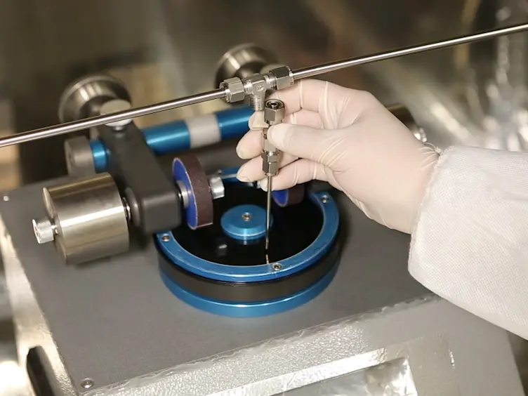 Testing of Nanoparticle Release from a Composite Containing Nanomaterial Using a Chamber System