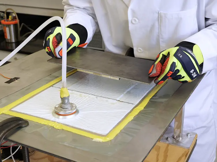 Magnet Assisted Composite Manufacturing: A Flexible New Technique for Achieving High Consolidation Pressure in Vacuum Bag/Lay-Up Processes