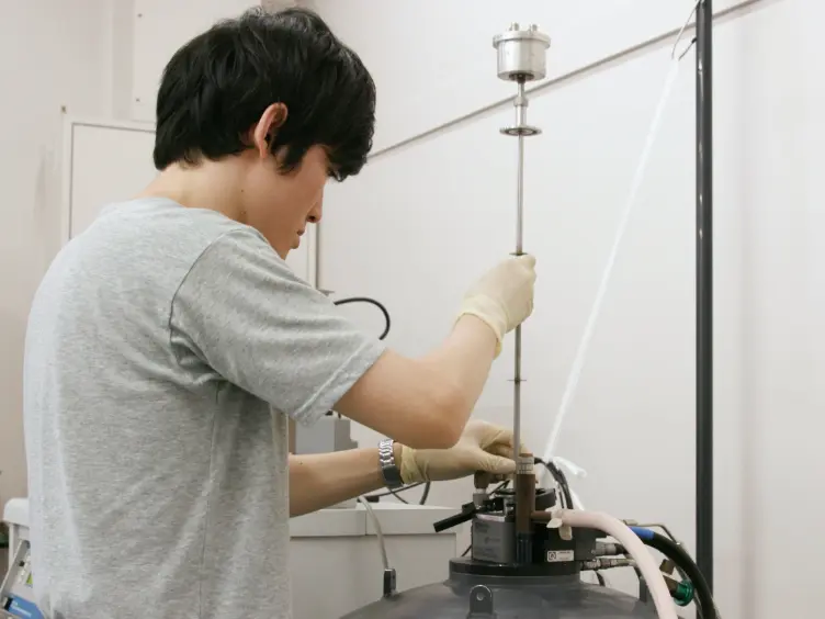Measuring Magnetically-Tuned Ferroelectric Polarization in Liquid Crystals