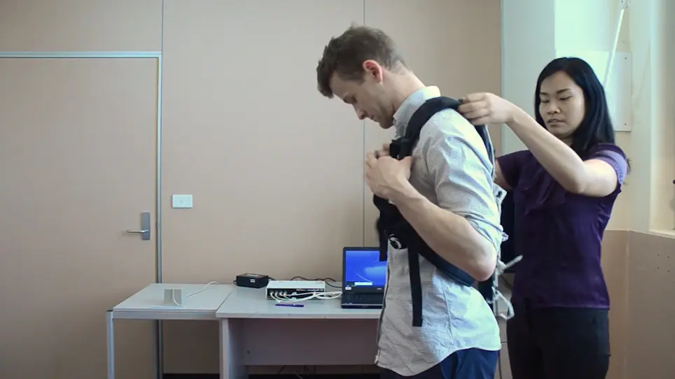 An Instrumented Pull Test to Characterize Postural Responses
