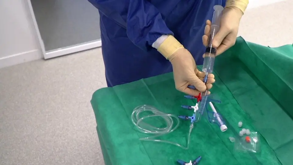 A Protocol to Set Up Needle-Free Connector with Positive Displacement on Central Venous Catheter in Intensive Care Unit