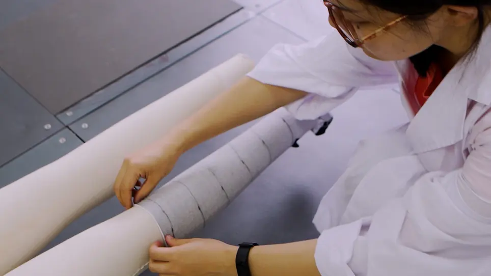Fabrication of Compressed Hosiery and Measurement of its Pressure Characteristic Exerted on the Lower Limbs