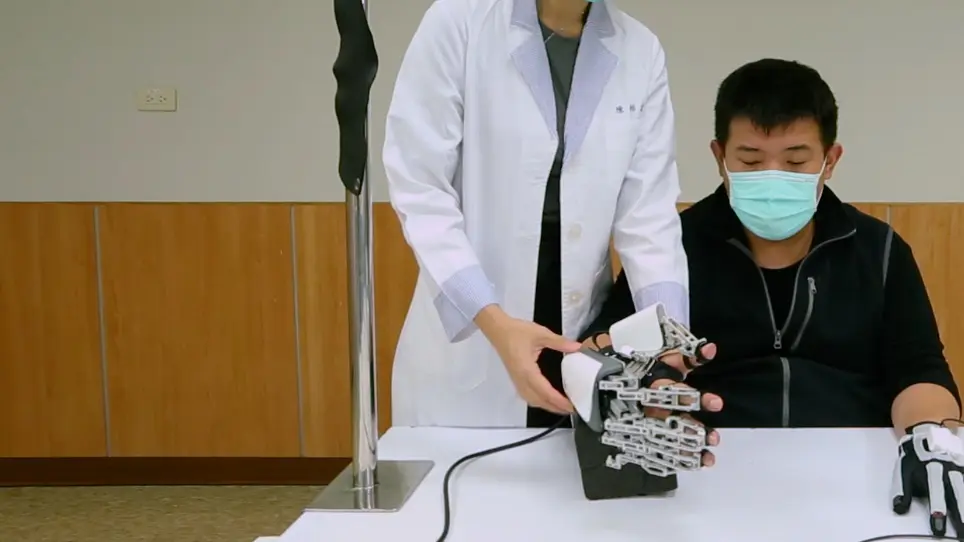 Development of a Novel Task-oriented Rehabilitation Program using a Bimanual Exoskeleton Robotic Hand