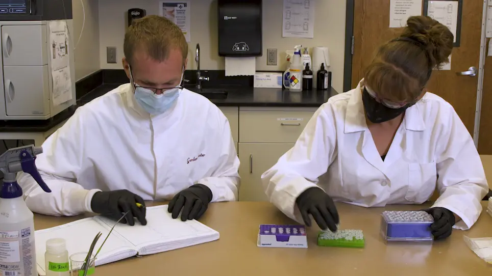 Modified Methods for Loading of High-Throughput DNA Extraction Plates Reduce Potential for Contamination