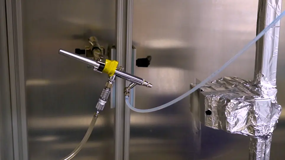 Solution Blow Spinning of Polymeric Nano-Composite Fibers for Personal Protective Equipment