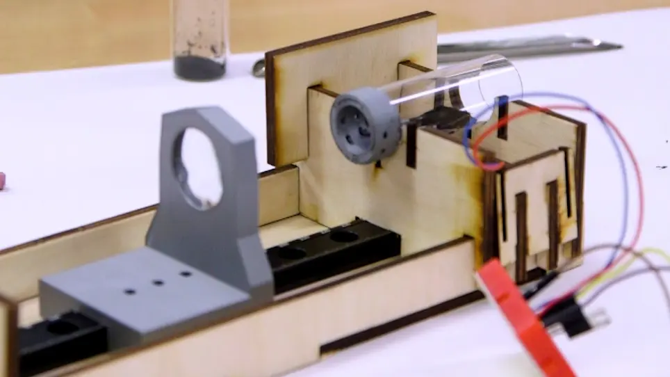 Fabrication and Testing of Miniature Automatic Photophoretic Trapping Rigs