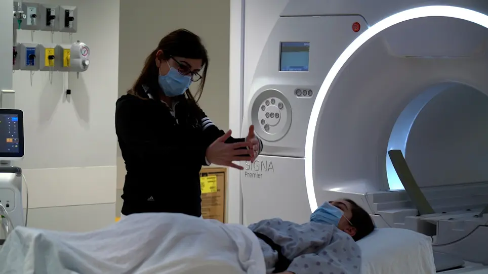 Oxygenation-sensitive Cardiac MRI with Vasoactive Breathing Maneuvers for the Non-invasive Assessment of Coronary Microvascular Dysfunction