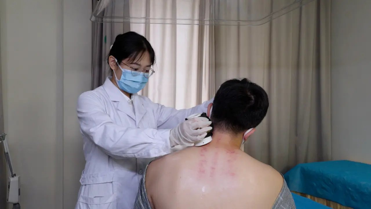 Warm Moxibustion and Scraping as a Traditional Chinese Medicine Therapy for Cervical Spondylosis Treatment
