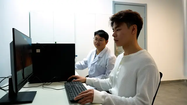 Estimate the Cognitive Load Using Electrocardiographic Measure: A Human-AI Collaborative Task