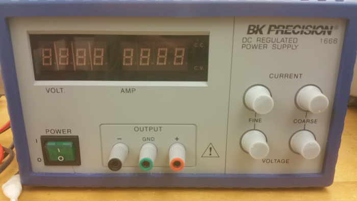 DC power supply setup; voltage, current controls for electronics experiments and circuit testing.